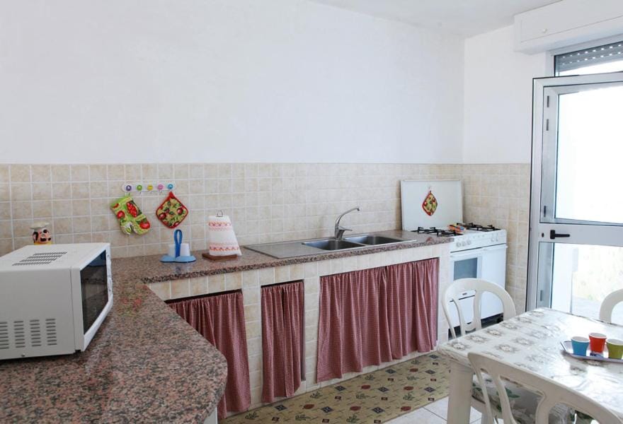 CASA FRONTE MARE POSTO ROSSO 8 POSTI LETTO House in Apulia