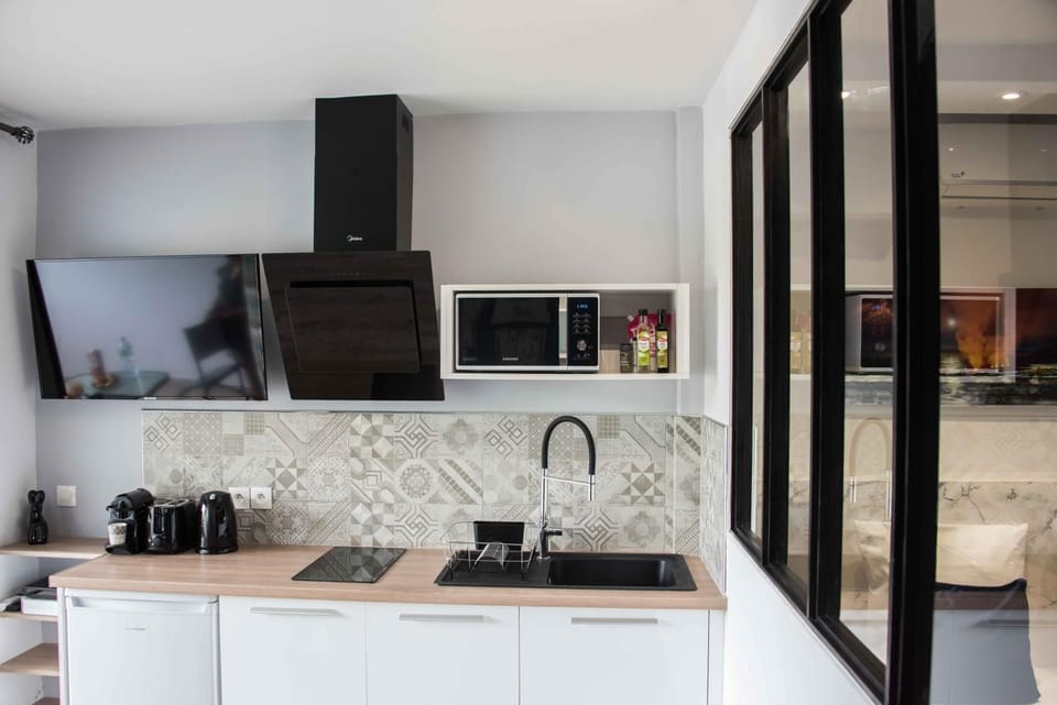 Communal lounge/ TV room, TV and multimedia, Coffee/tea facilities, Kitchen or kitchenette, Decorative detail, Communal kitchen, Drinks
