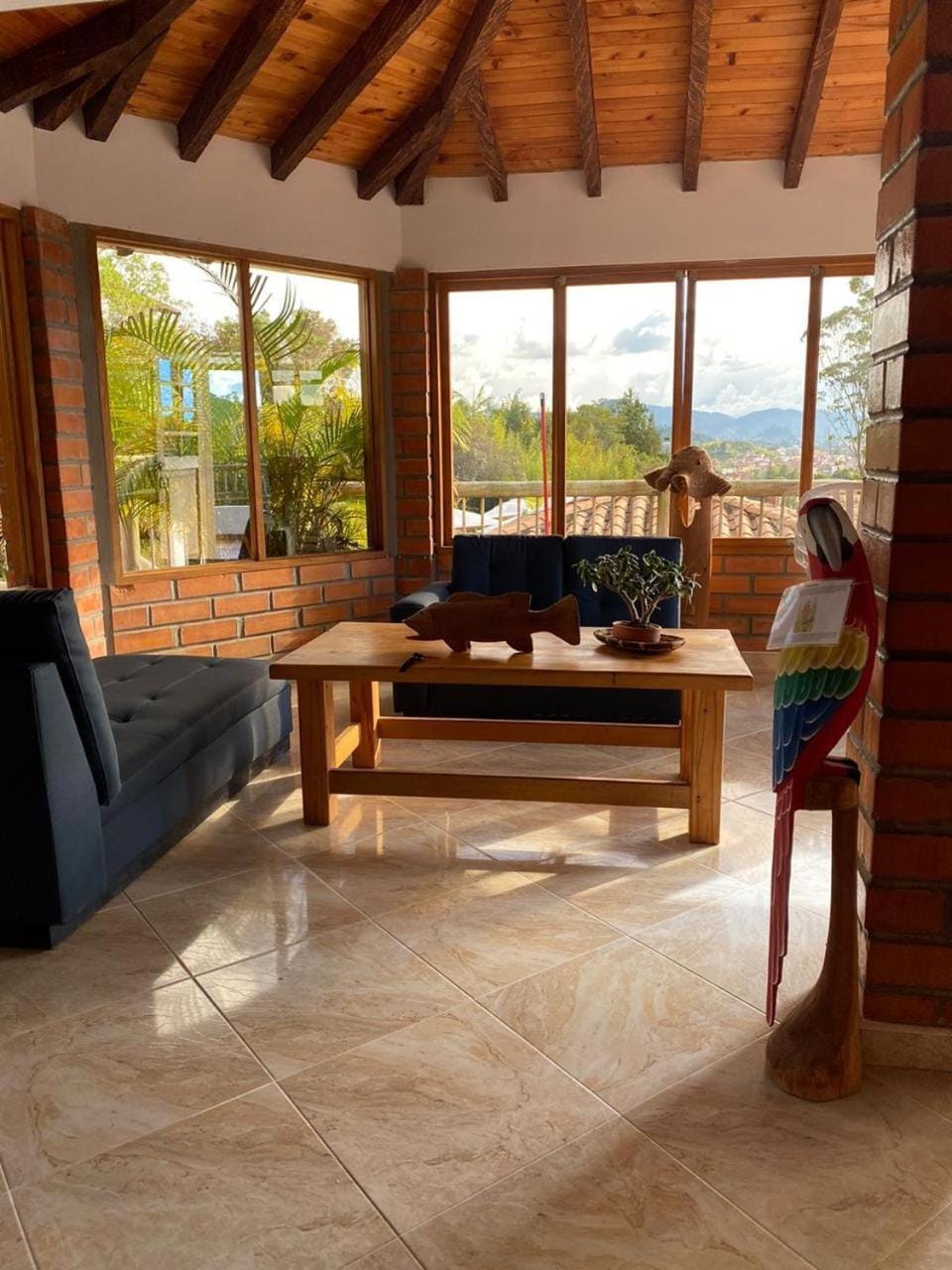View (from property/room), Balcony/Terrace, Living room, Seating area, Dining area, Mountain view, group of guests