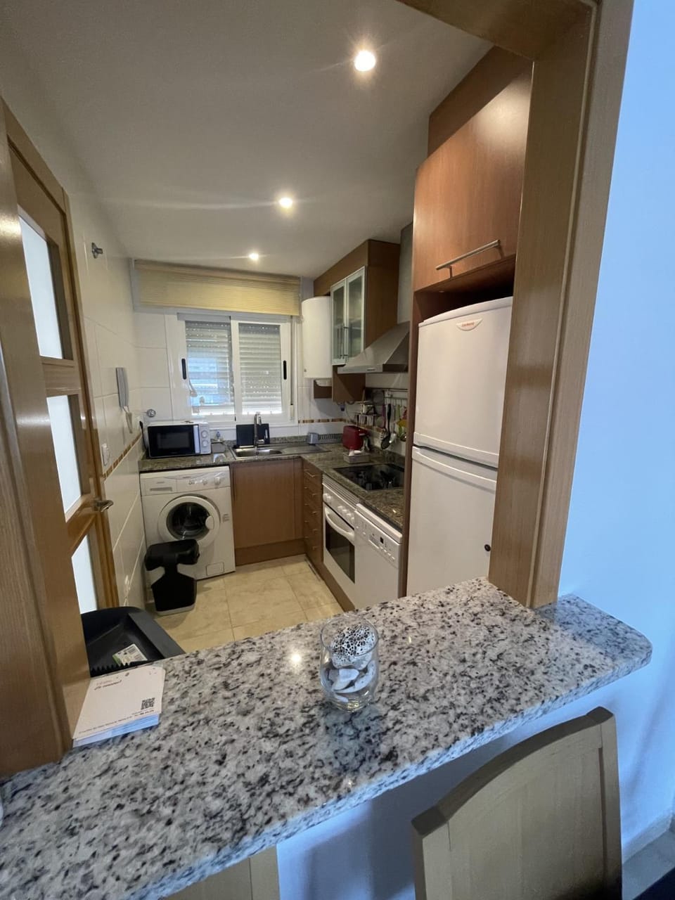 Kitchen or kitchenette, dishwasher, oven, stove, toaster