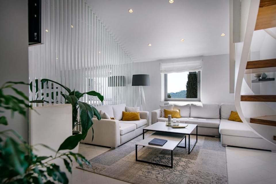 TV and multimedia, View (from property/room), Living room, Seating area, Sea view