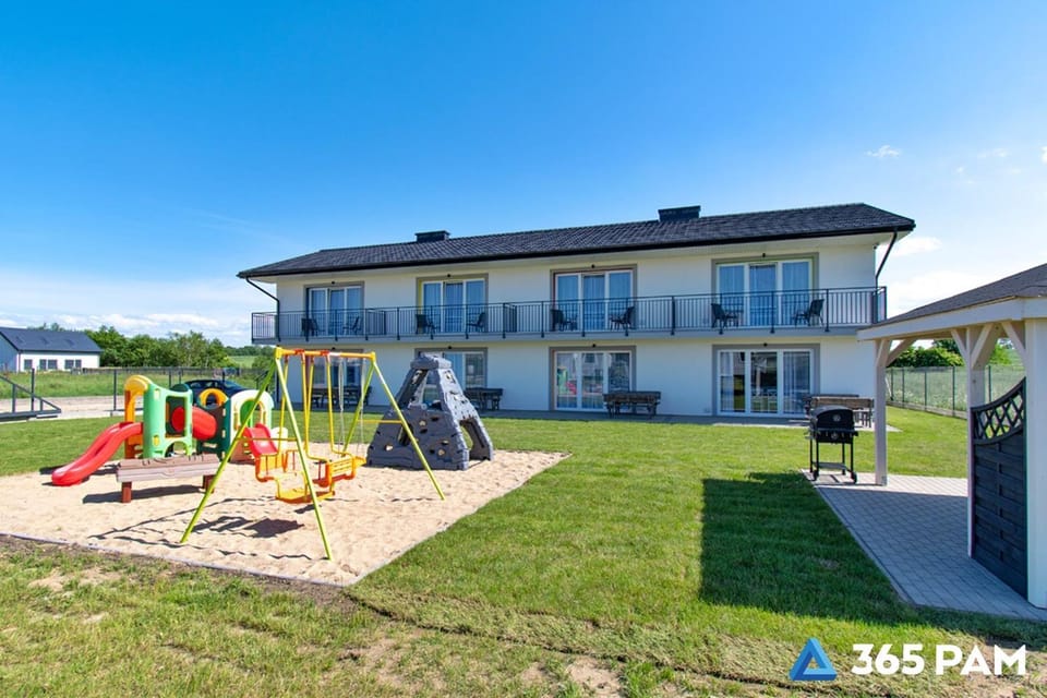 Property building, Day, Natural landscape, Children play ground, sunbed