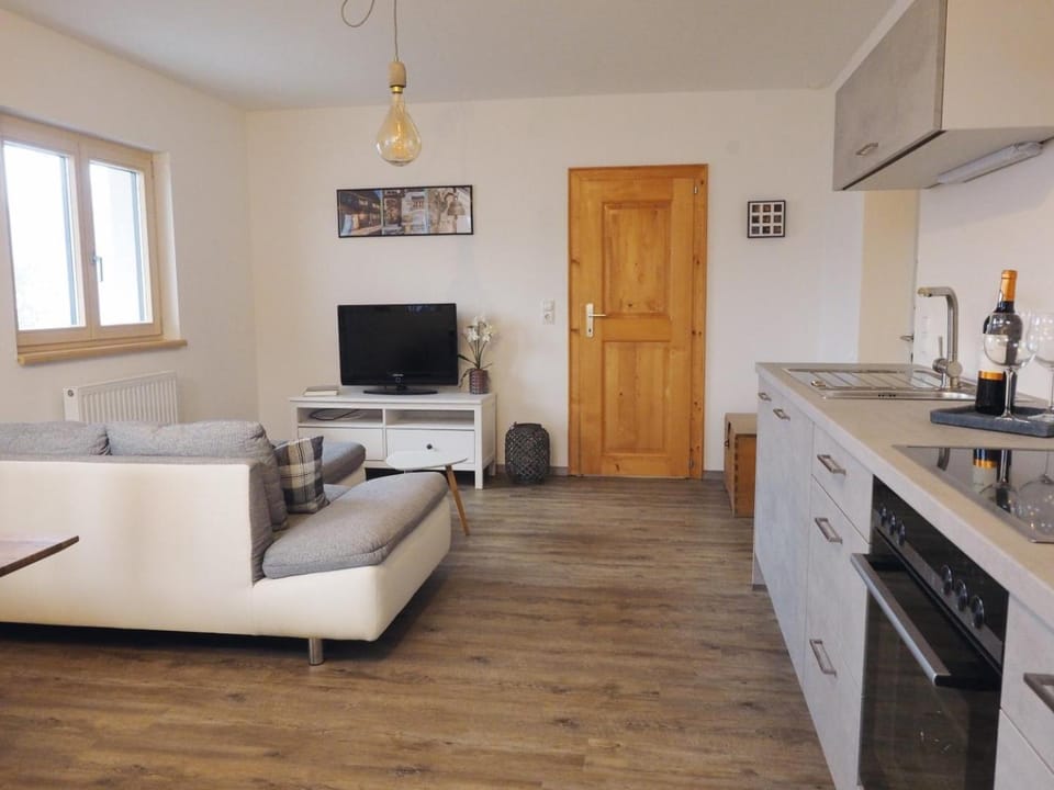 Kitchen or kitchenette, Living room, Seating area, Dining area