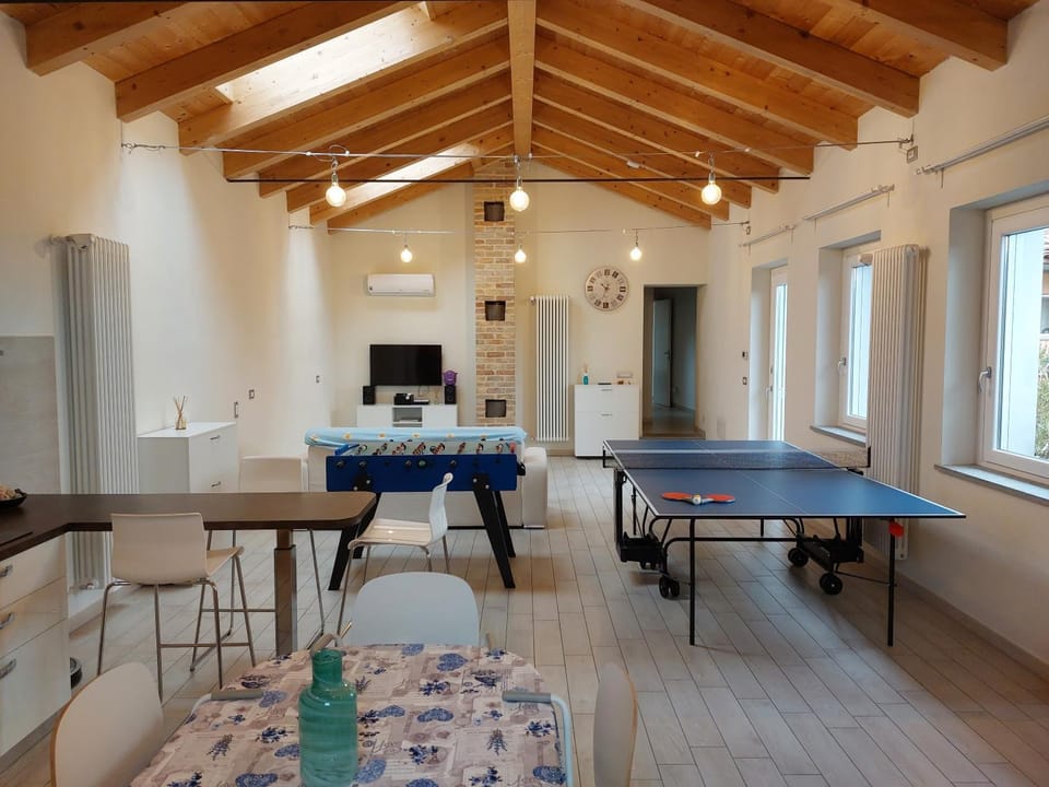 Game Room, Table tennis, Living room, Seating area, Dining area, kitchen