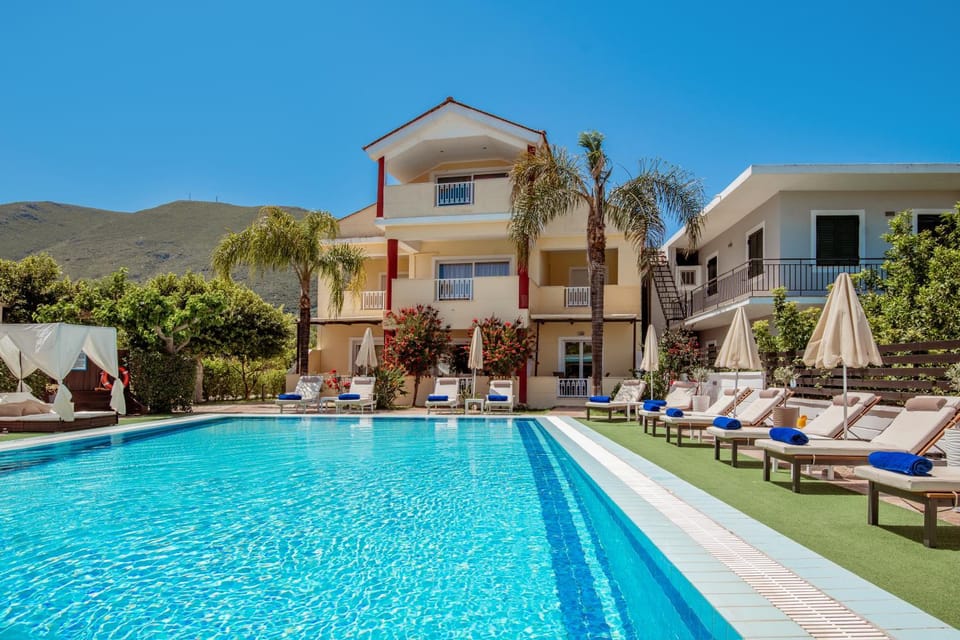 Property building, Natural landscape, Pool view, Swimming pool, sunbed
