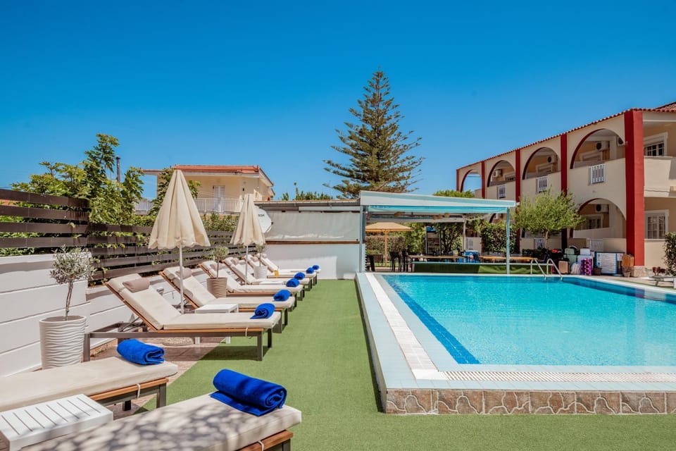 Property building, Pool view, Swimming pool, sunbed