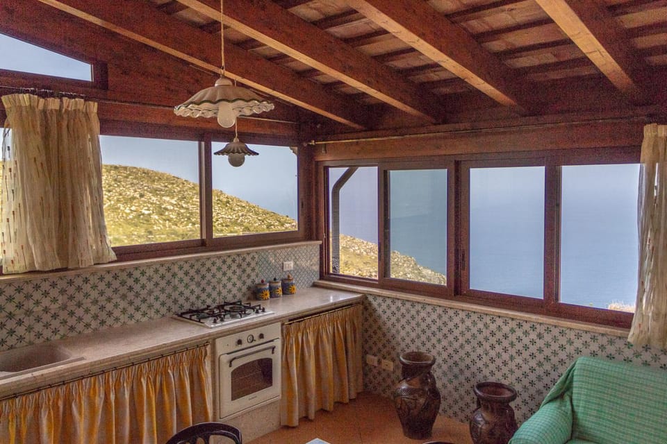 Natural landscape, Kitchen or kitchenette, Living room, Dining area, Mountain view, Sea view, stove