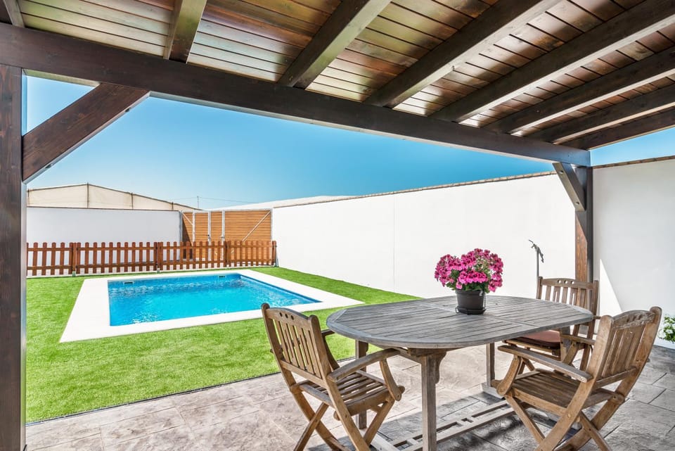 Property building, Living room, Swimming pool