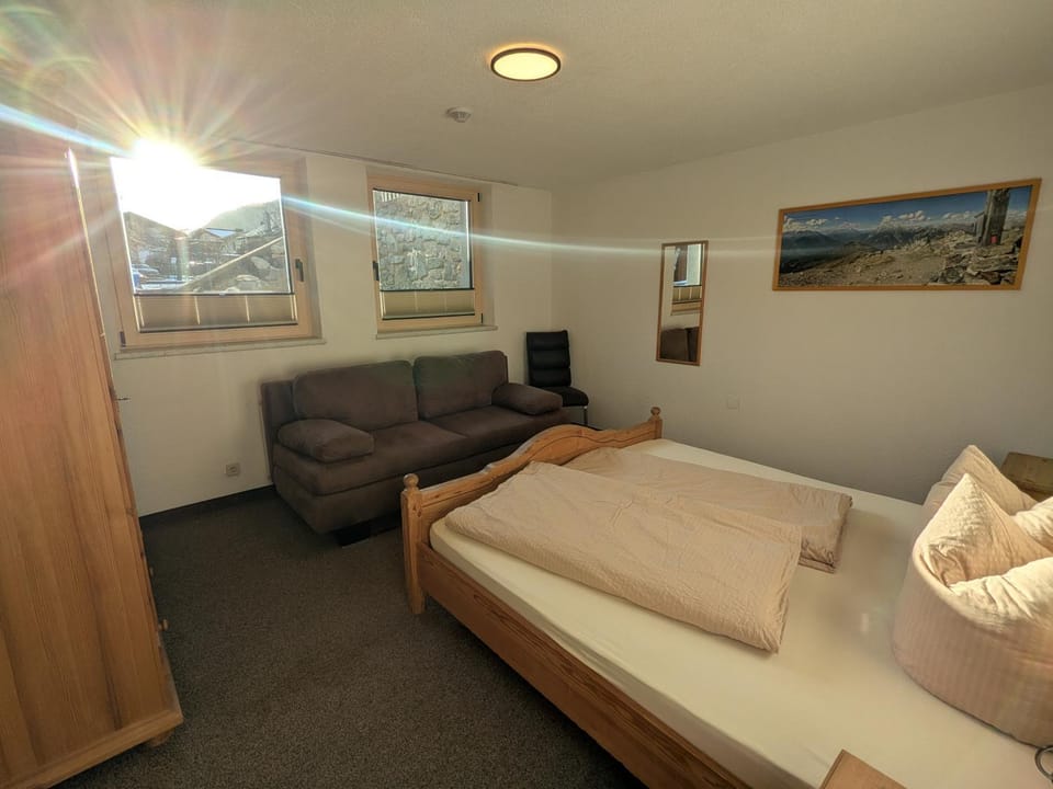 Bed, Seating area, Bedroom