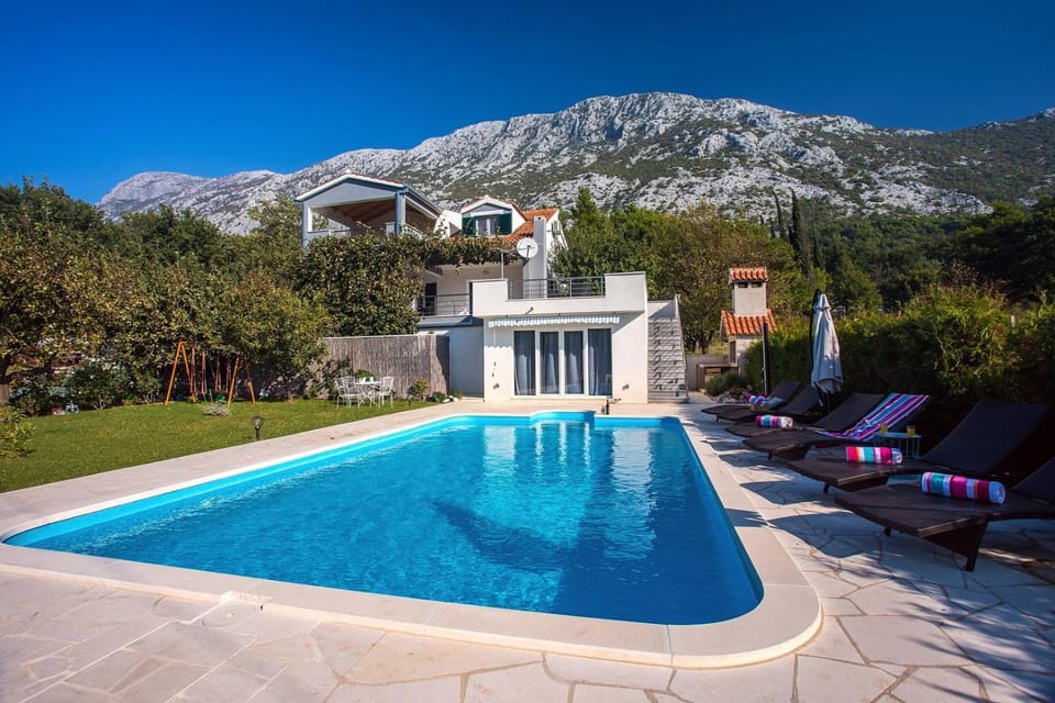 Property building, BBQ facilities, Children play ground, Garden, Balcony/Terrace, Seating area, Dining area, Hiking, Cycling, Mountain view, Swimming pool