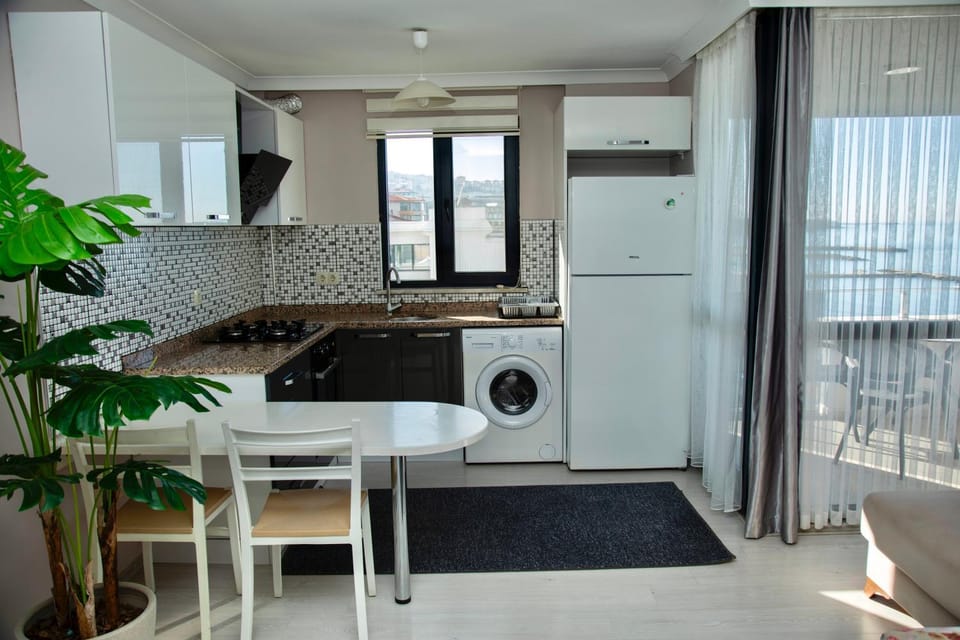 Kitchen or kitchenette, Living room, Seating area, Dining area, dishwasher, minibar, oven, stove, washing machine