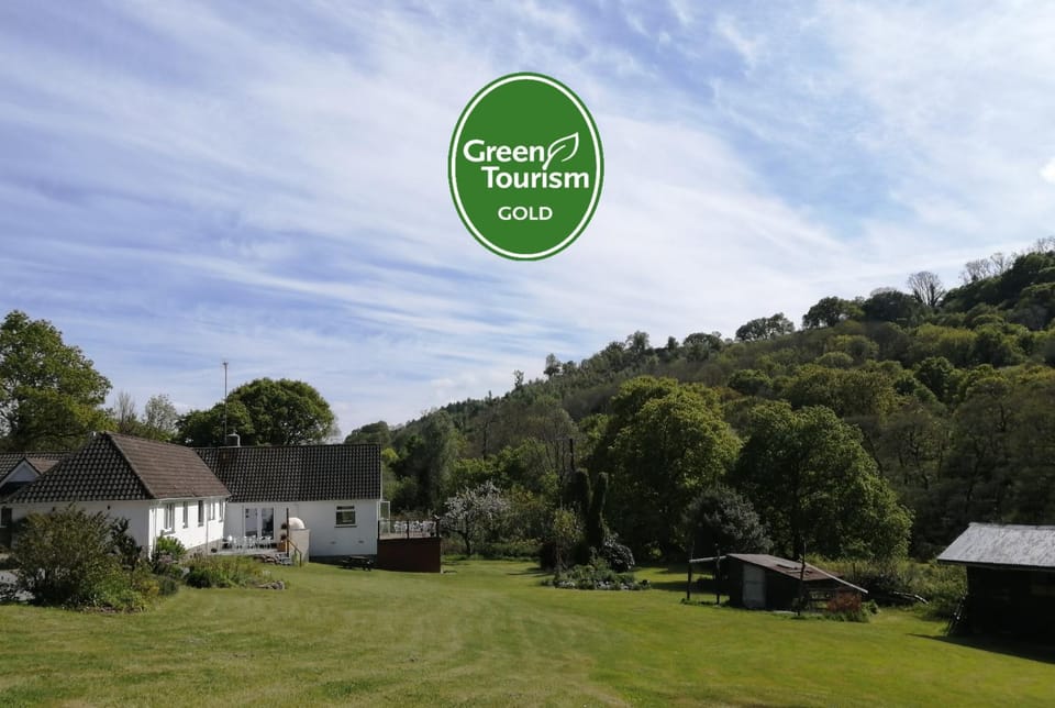 Property building, Natural landscape, Garden, View (from property/room), Logo/Certificate/Sign, Garden view, Certificate/Award