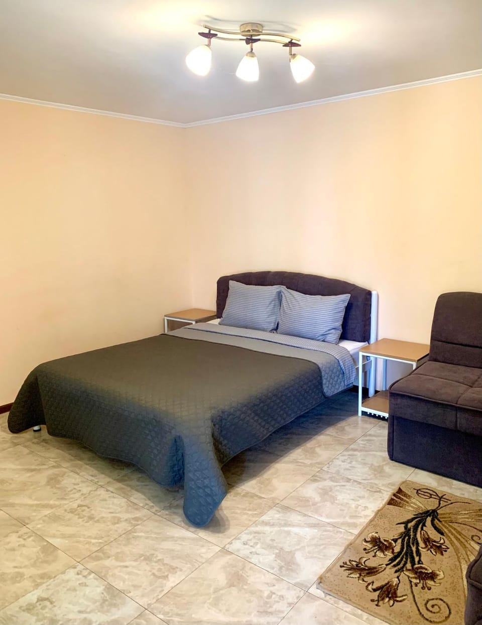 Bed, Living room, Seating area, Bedroom