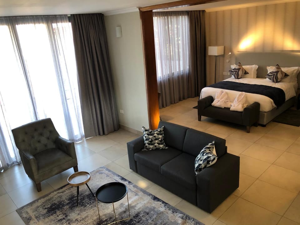 Bed, Living room, Seating area