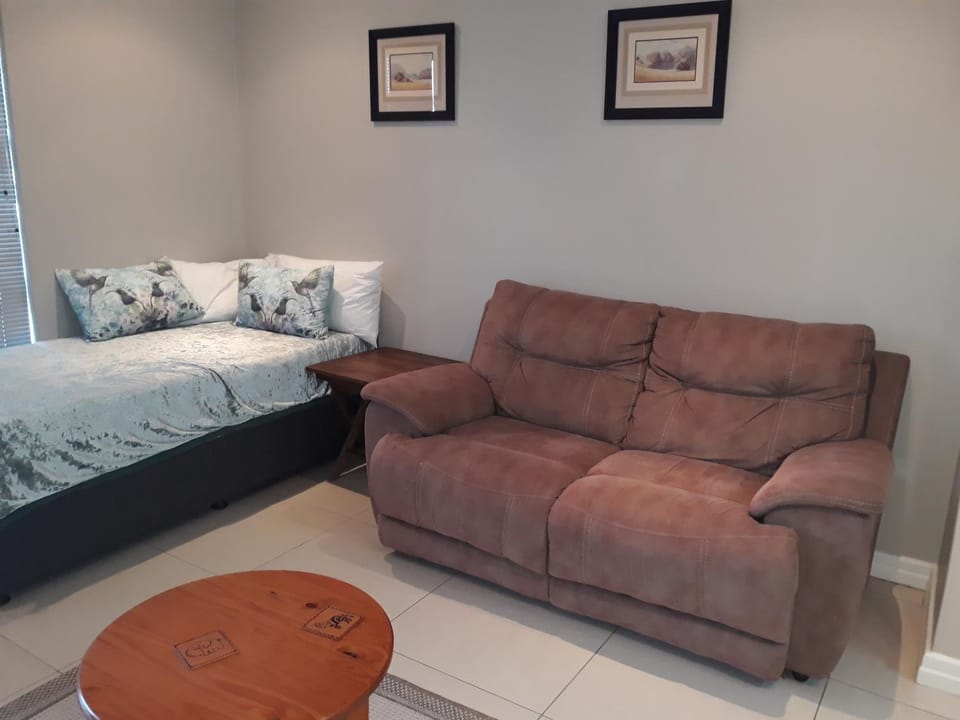 Bed, Living room, Seating area