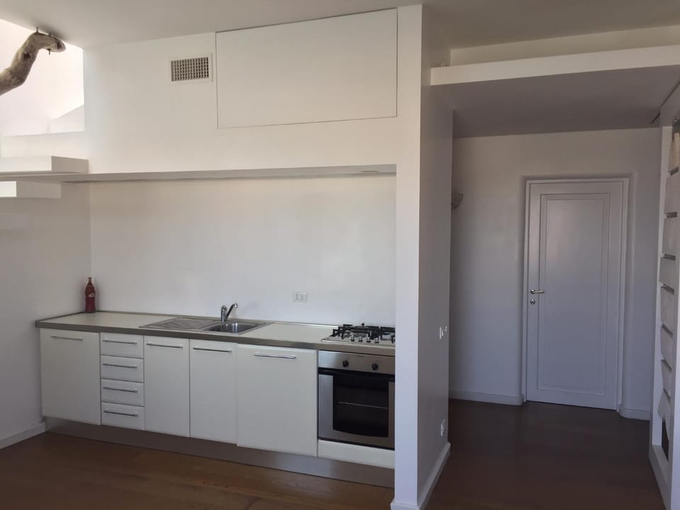 Kitchen or kitchenette, stove
