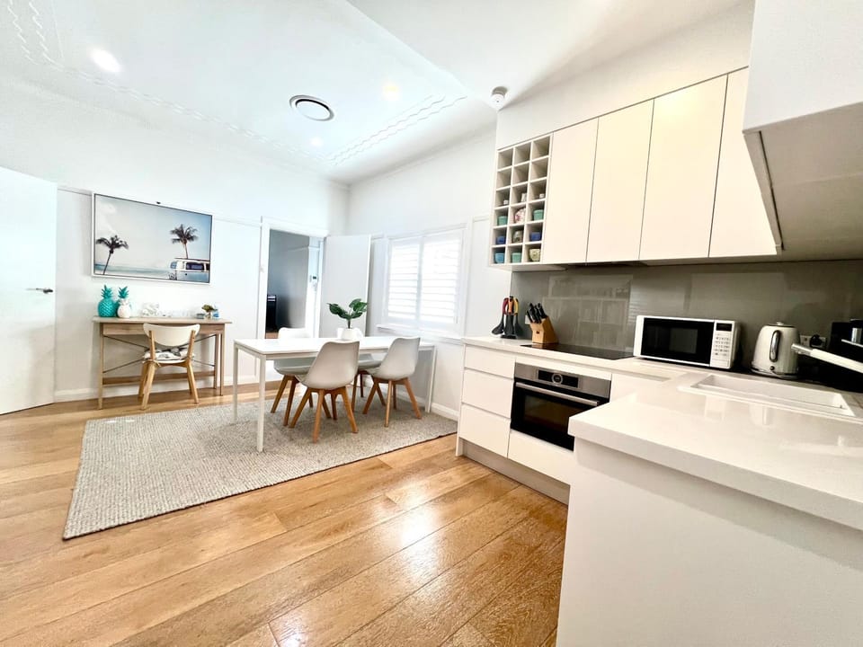 Kitchen or kitchenette, Seating area, Dining area, dishwasher, oven, stove, toaster