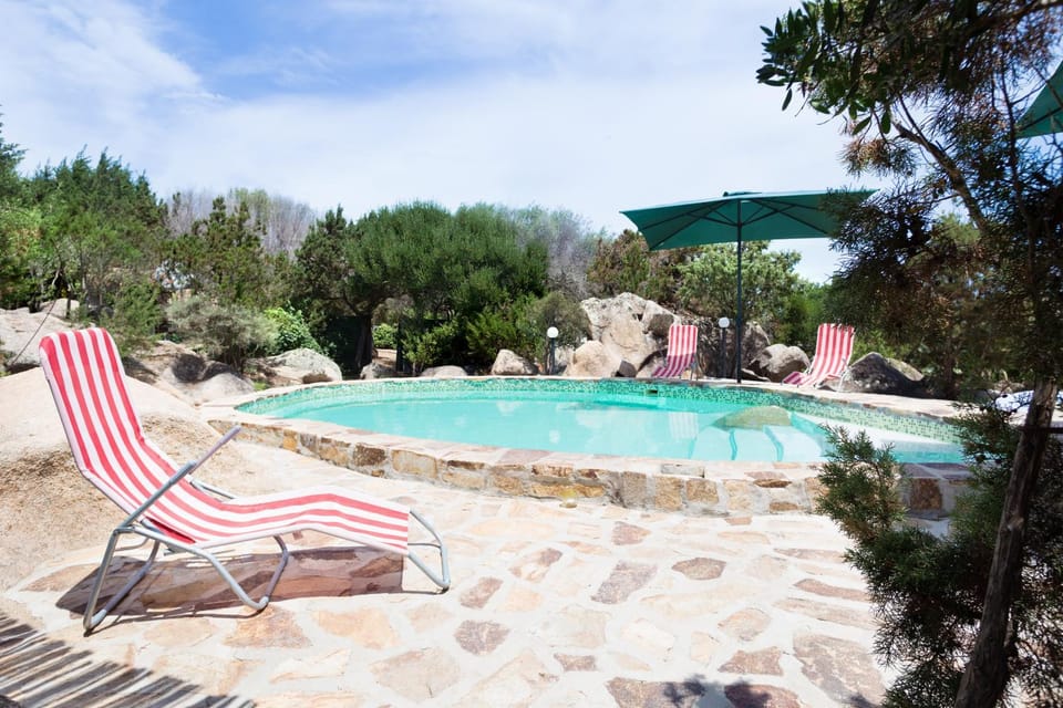 Property building, Living room, Swimming pool