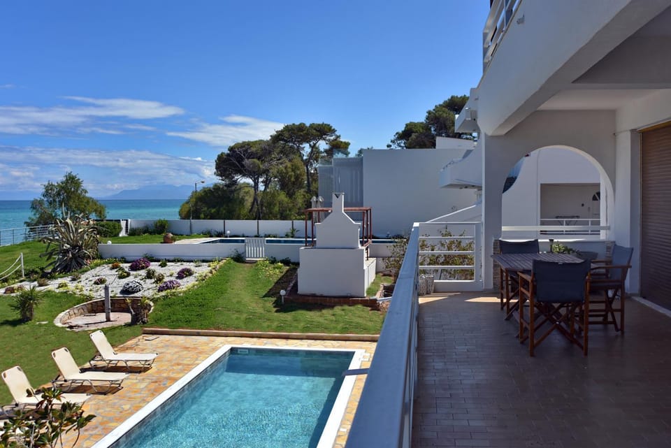 Property building, Patio, Spring, Day, Natural landscape, Garden, View (from property/room), Balcony/Terrace, Dining area, Garden view, Pool view, Sea view, Swimming pool, sunbed
