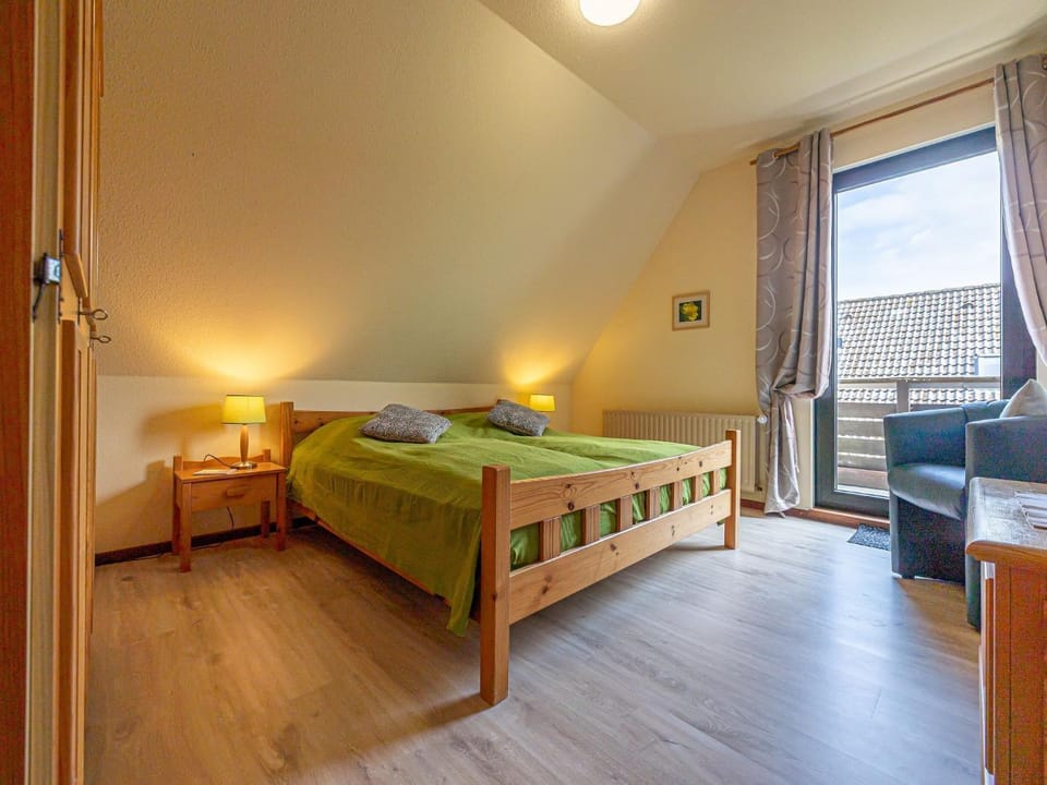 Bed, Seating area, Bedroom