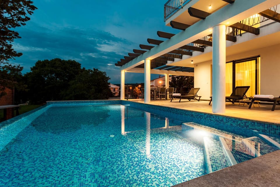 Property building, Night, Swimming pool, Swimming pool, sunbed