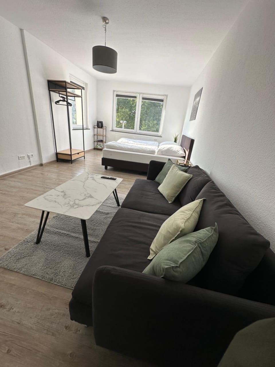 Bed, Living room, Seating area, Bedroom