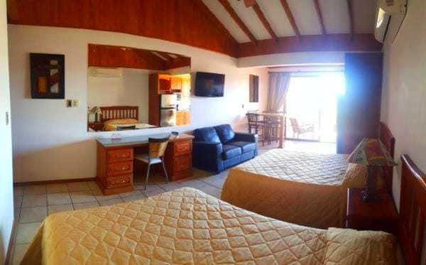 Kitchen or kitchenette, Living room, Photo of the whole room, Seating area, Dining area, Bedroom