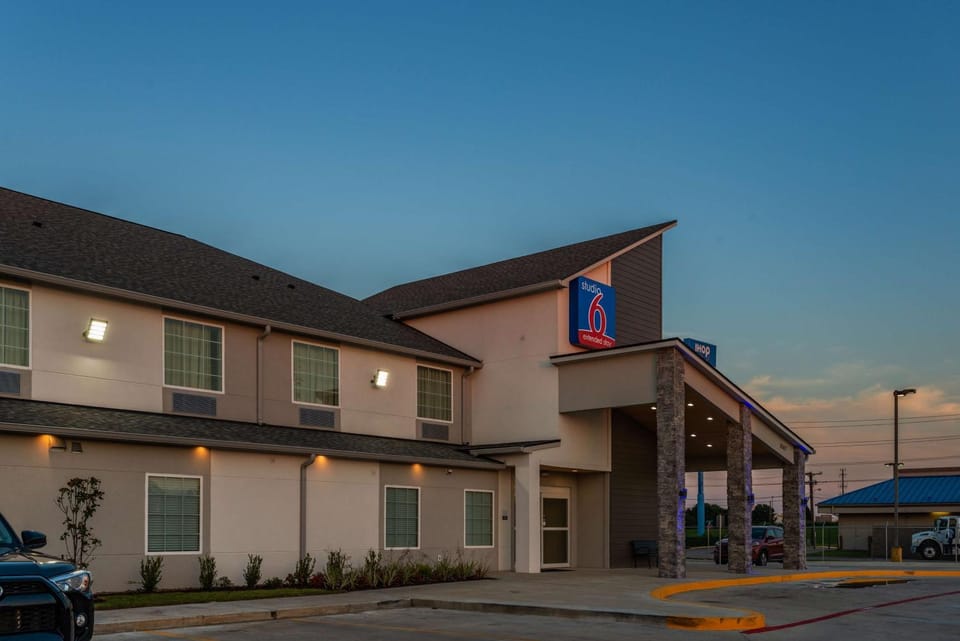 Property building, Facade/entrance, Property logo or sign, On site, Time of day, Sunset