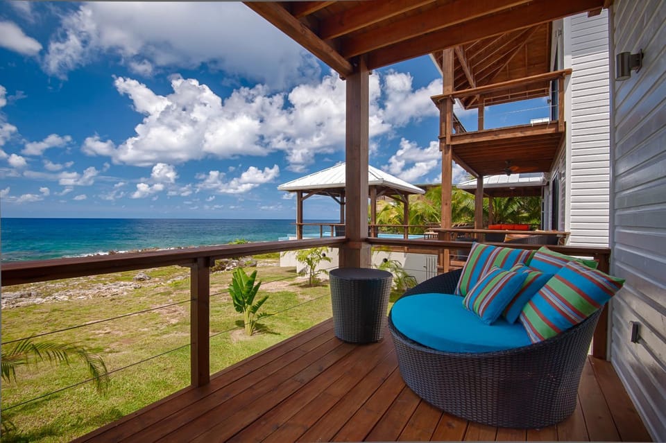 View (from property/room), Balcony/Terrace, Seating area, Beach, Sea view