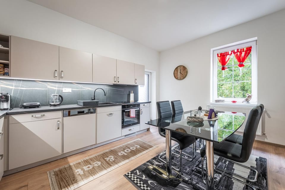 Kitchen or kitchenette, Seating area, Dining area, dishwasher, oven, stove