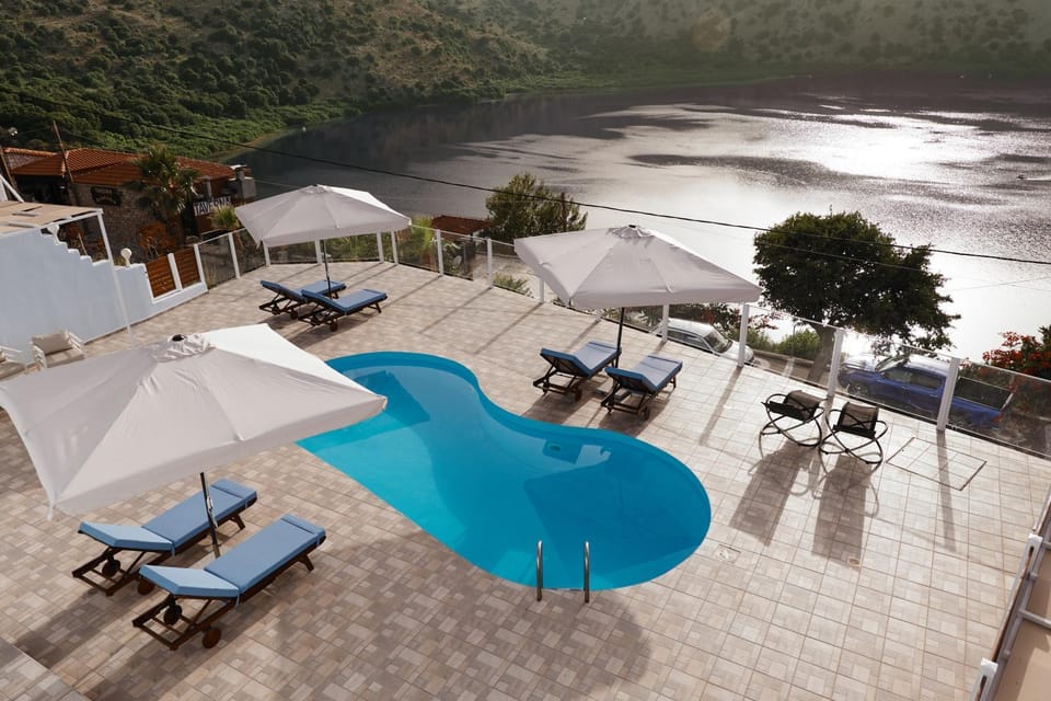 Patio, Day, Natural landscape, Lake view, Pool view, Swimming pool, sunbed