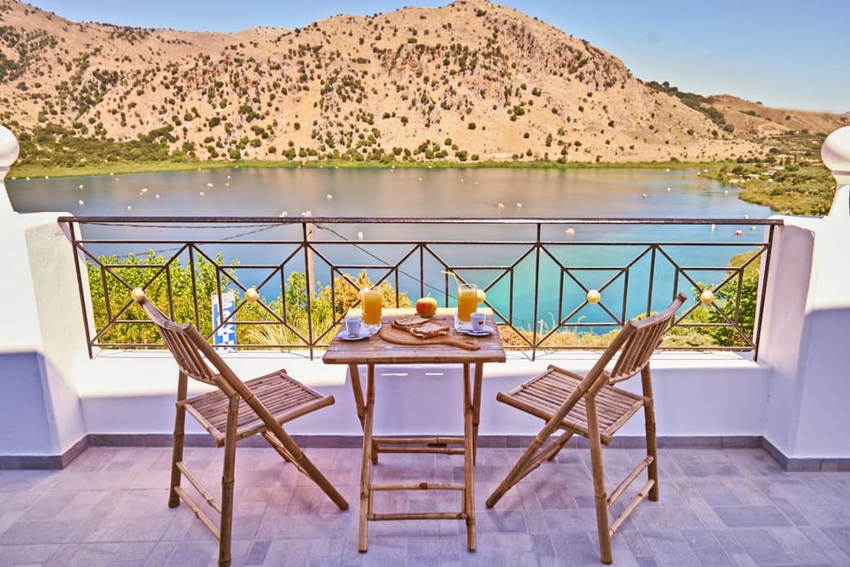 Property building, Day, Balcony/Terrace, Balcony/Terrace, Lake view, Lake view, Mountain view, Mountain view