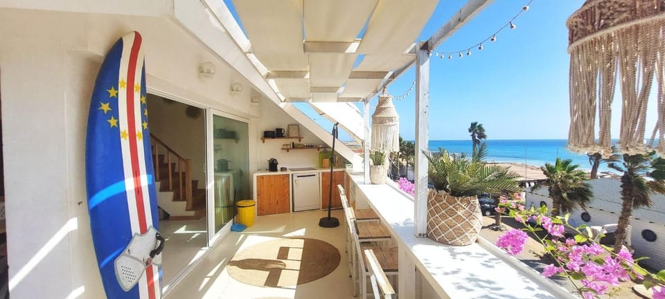 Beach penthouse with rooftopbar and Starlink WiFi, spectacular 180 degrees ocean view Apartment in Santa Maria