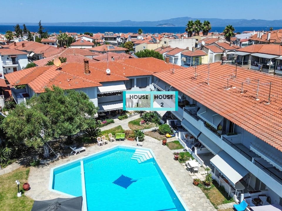 Property building, Natural landscape, Bird's eye view, Swimming pool