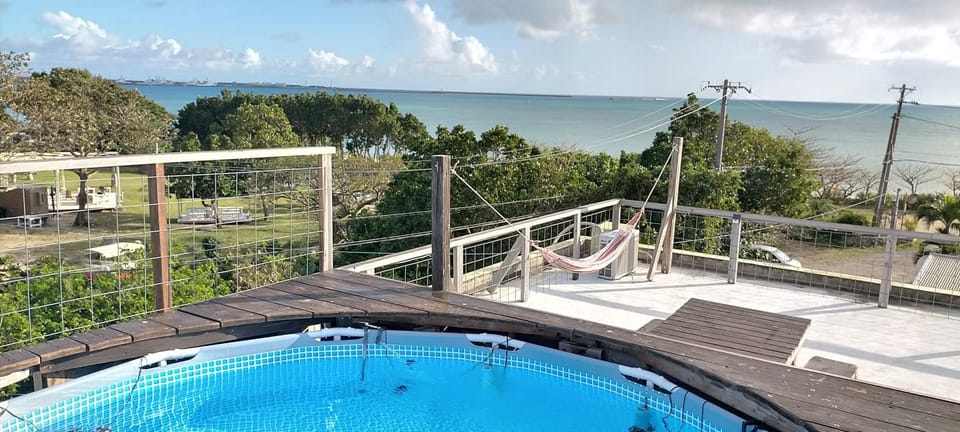 パームｽﾞ,ﾌﾟﾗｲﾍﾞｰﾄﾌﾟｰﾙ,ﾐﾆﾋﾞﾘﾔｰﾄﾞ海と星空見える96平米 BBQ台 P1台 wii WiFi House in Okinawa Prefecture