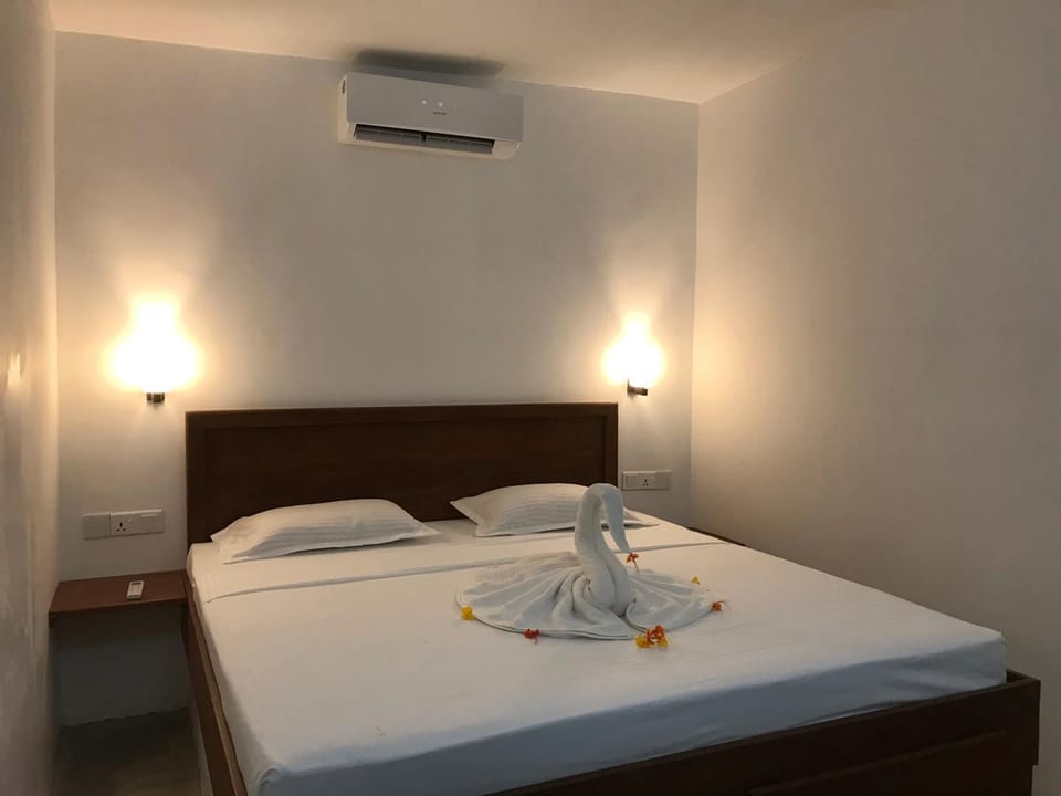 Bed, air conditioner
