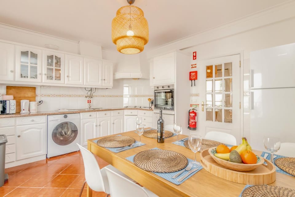Kitchen or kitchenette, dishwasher, oven, stove, toaster