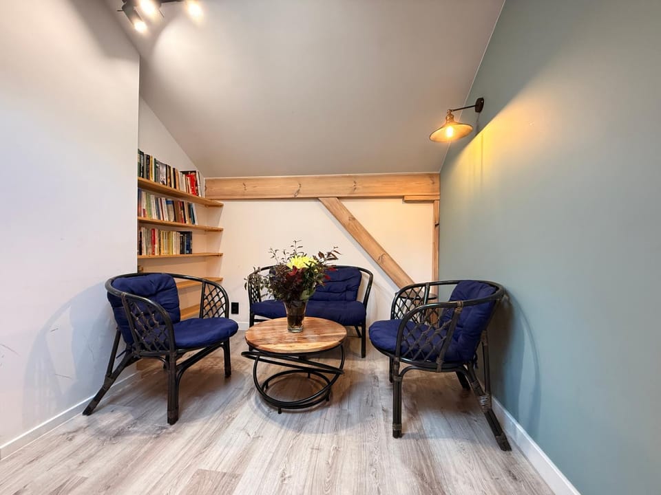 Library, Living room, Seating area, Dining area