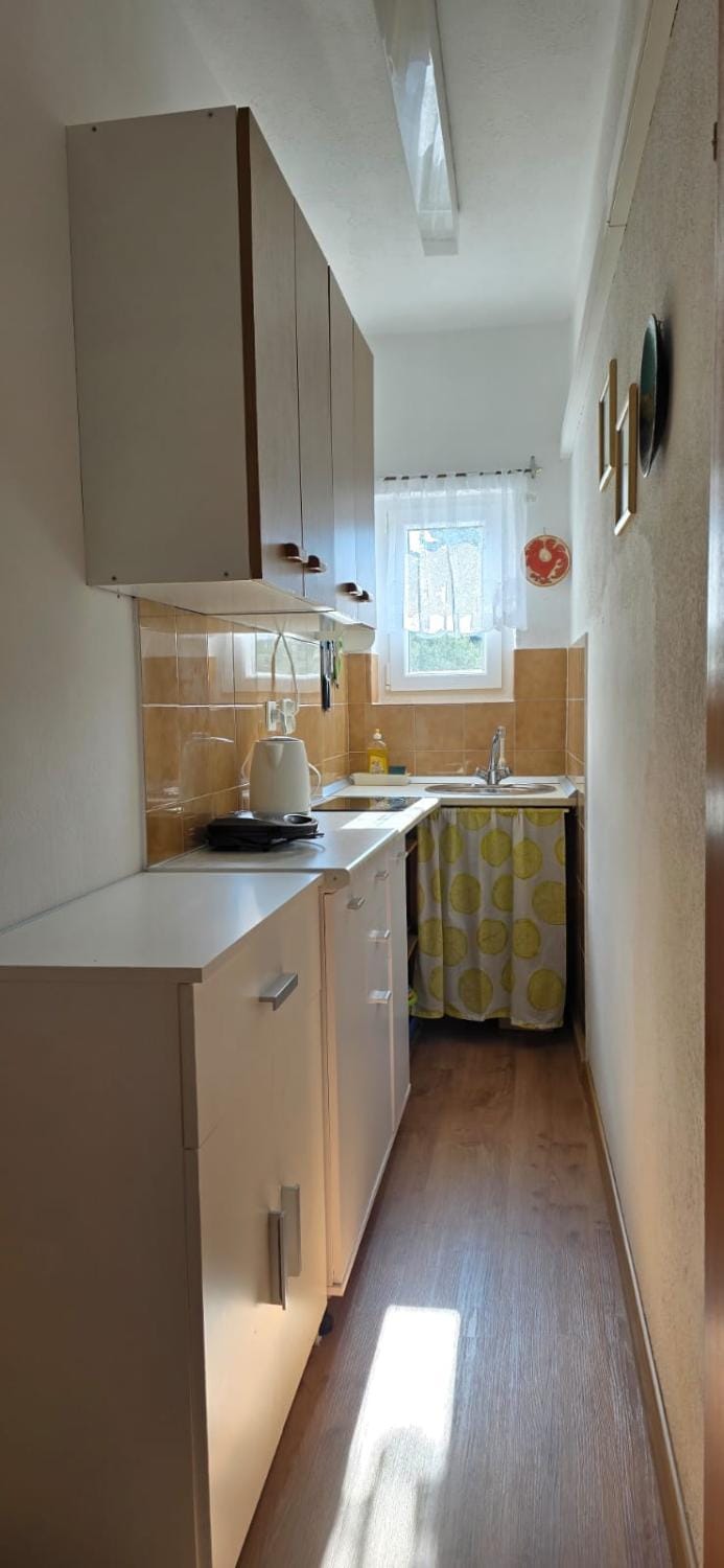 Kitchen or kitchenette, stove