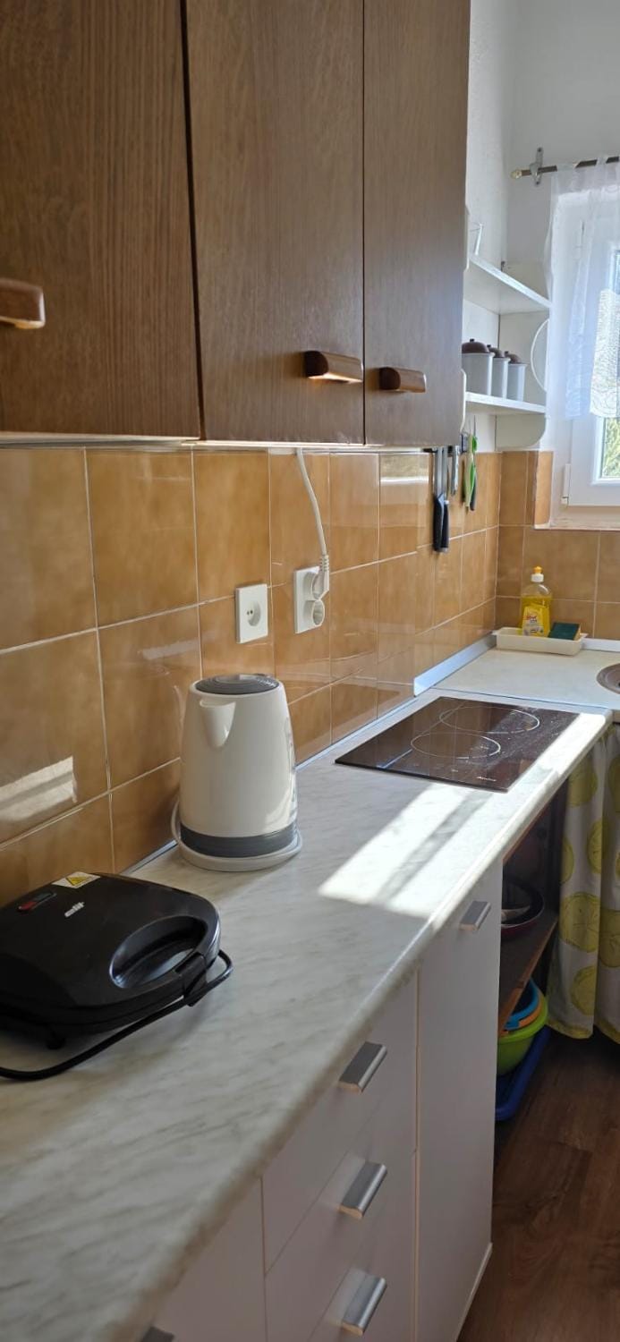 Kitchen or kitchenette, stove