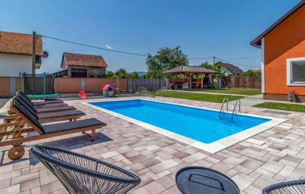 Patio, Day, Pool view, Swimming pool, sunbed