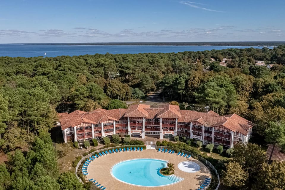 Property building, Nearby landmark, Day, Natural landscape, Bird's eye view, Swimming pool