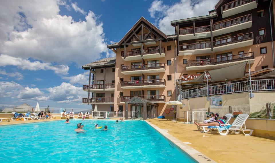 Property building, Patio, Day, Natural landscape, View (from property/room), Balcony/Terrace, Evening entertainment, Pool view, Swimming pool, sunbed