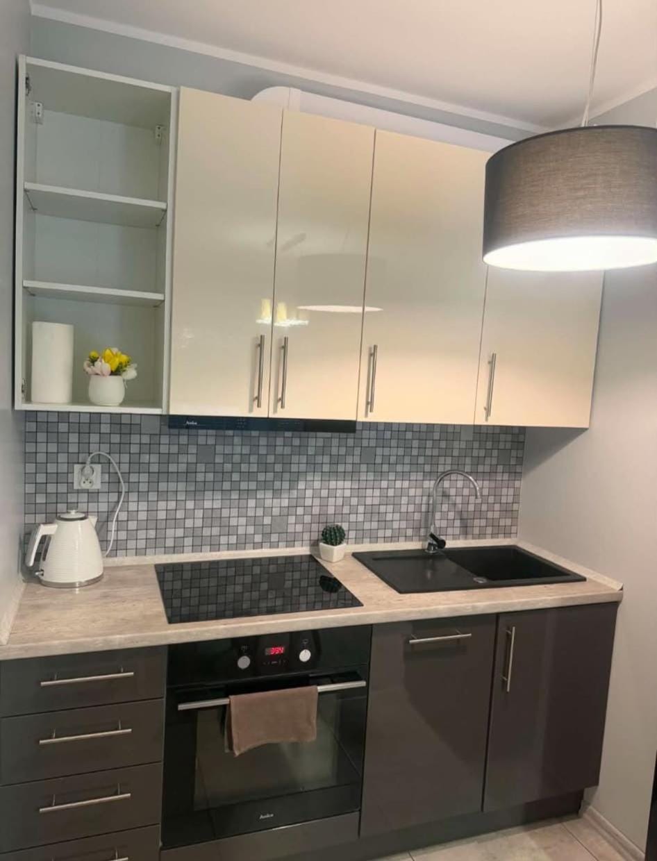 Apartament Strefa Czasu z wewnętrznym ogrodzonym parkingiem Apartment in Greater Poland Voivodeship
