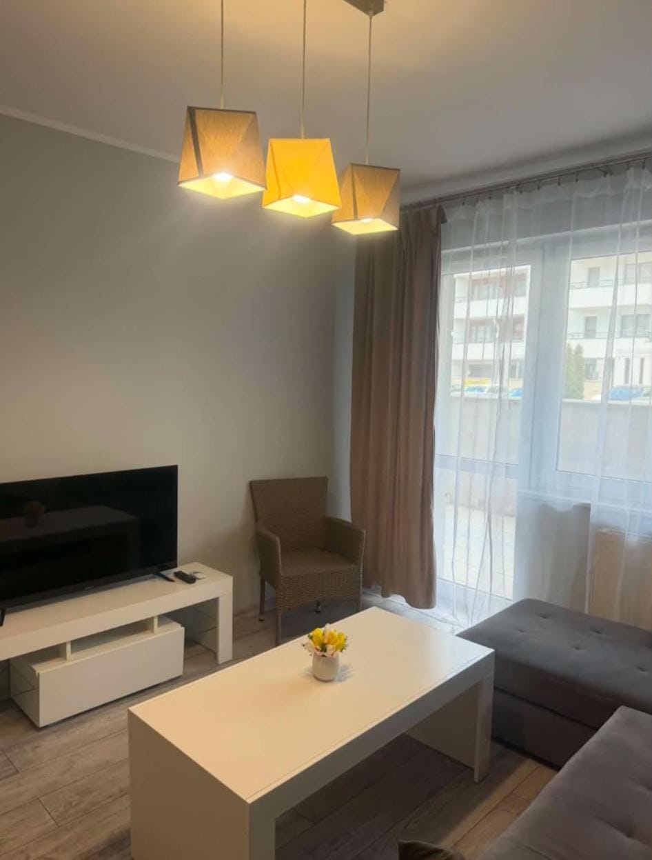 Apartament Strefa Czasu z wewnętrznym ogrodzonym parkingiem Apartment in Greater Poland Voivodeship