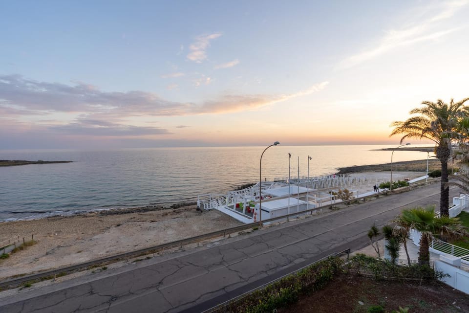 Property building, Nearby landmark, Natural landscape, Beach