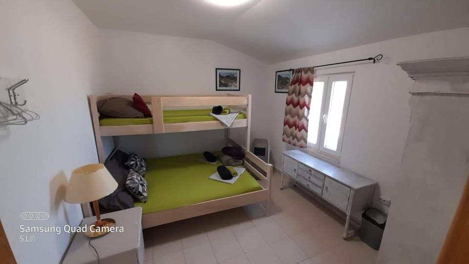 Property building, Bed, View (from property/room), Bedroom, Sea view, bunk bed, wardrobe, air conditioner