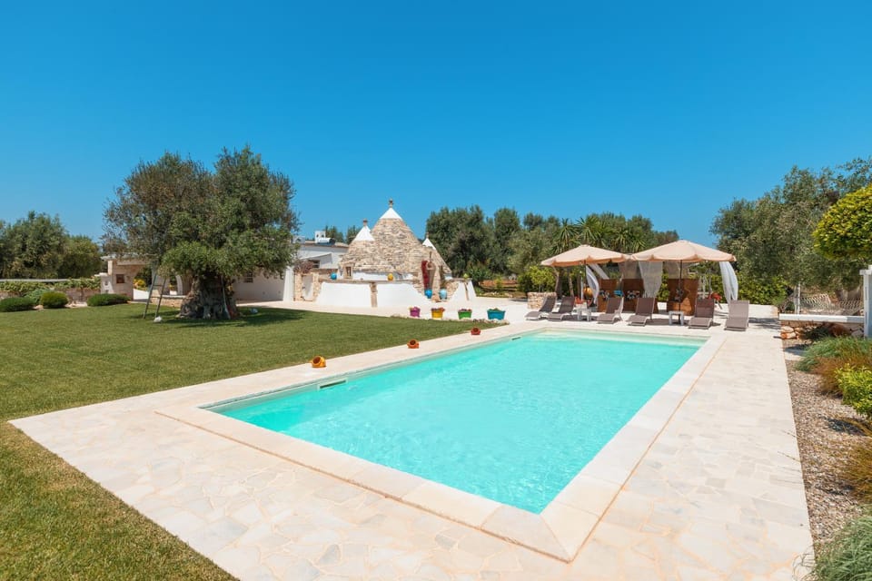 Property building, Living room, Swimming pool