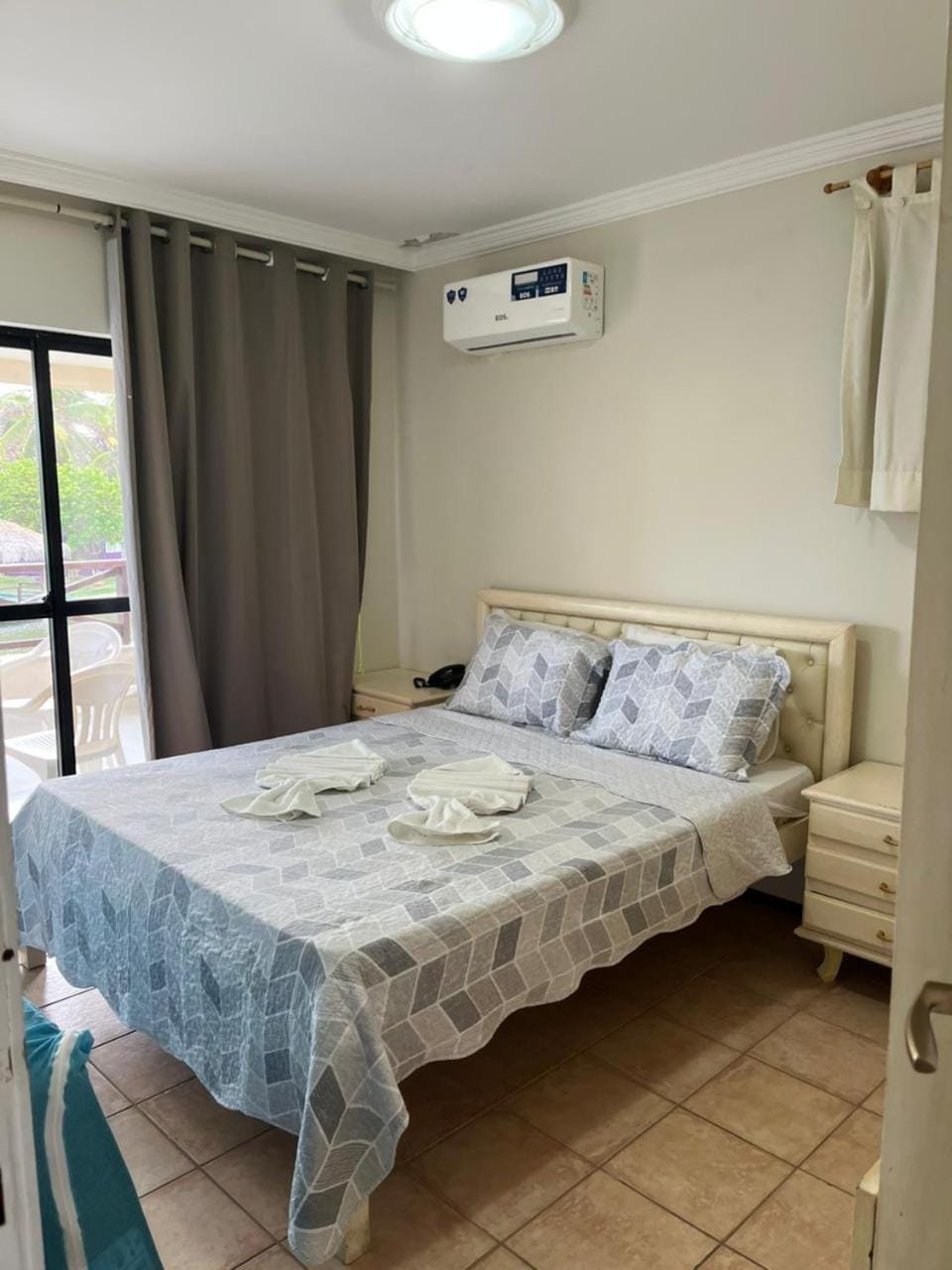 Bed, Photo of the whole room, Bedroom, towels, air conditioner