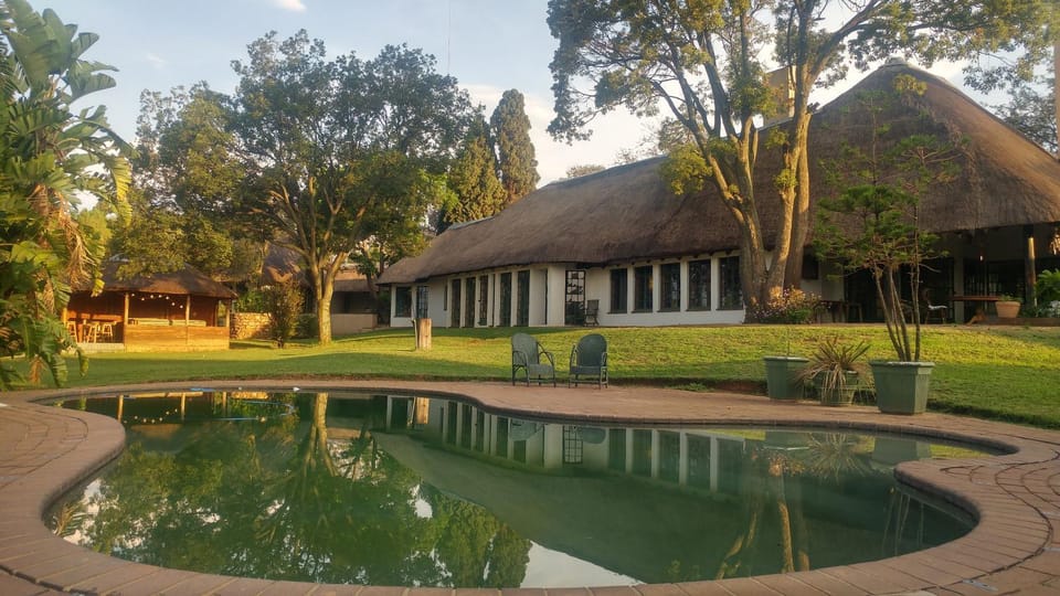 Property building, Natural landscape, Pool view